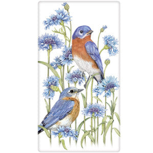 Two Bluebirds with blue flowers and green foliage leaves.