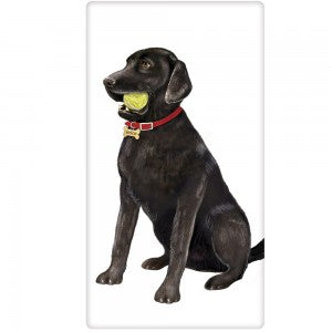 Black lab with red collar and bone tag, sitting with green tennis ball in mouth.