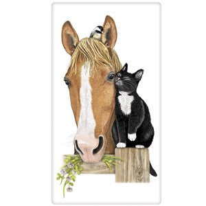 Horse and cat cuddling on a fence post.